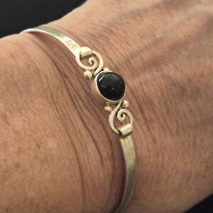 Silver Swirl Bracelet with Black Stone